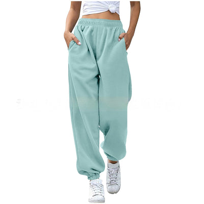 Woman wearing light blue jogging pants